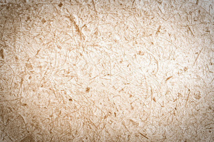 桑树纸纹理背景关闭了棕色的桑皮纸与木浆背景