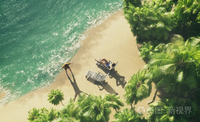 在一个热带岛屿上晒日光浴的情侣照片-正版商用图片1ql9l5-摄图新视界