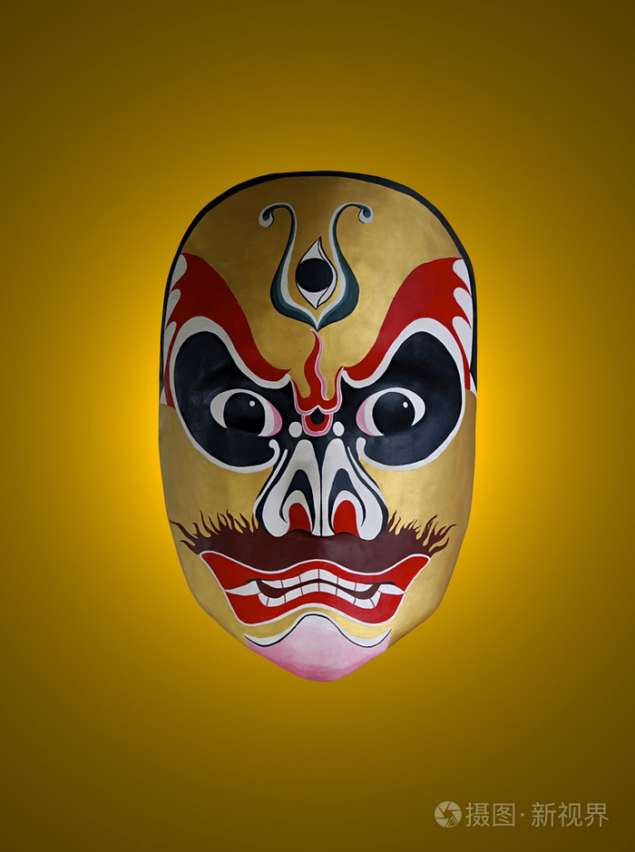 中国戏曲与金黄的孤立背景的面具