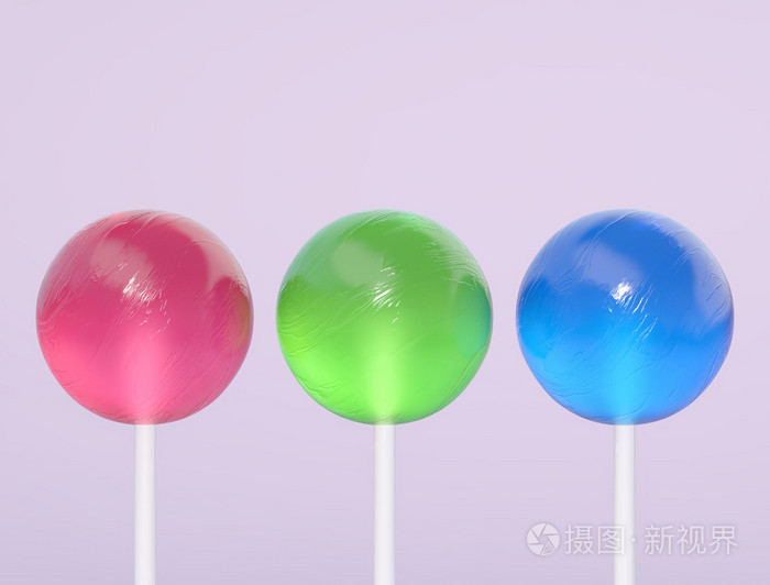 紫色背景上的三个棒棒糖