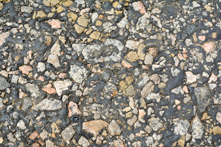 小石头,旧沥青,融化的沥青,旧的一张照片照片