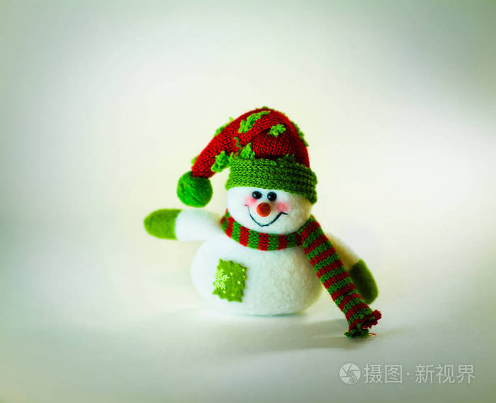 可爱的雪人，用白色背景上的围巾