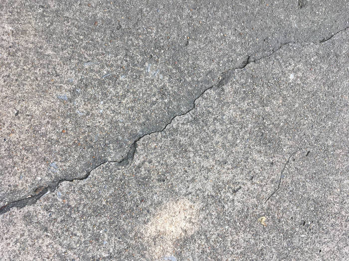 裂开的石头混凝土街道纹理