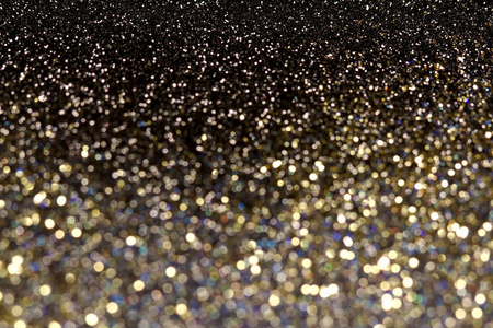 抽象彩色亮点抽象的黑暗彩色的闪光背景闪光光和软景,喜庆的色彩照片