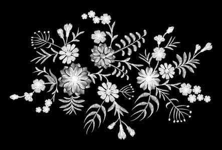 花在黑色背景上的白色的花边图案.仿刺绣.