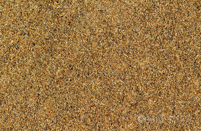 空旷的海滩砂为背景的的照片.用金色的沙子的热带海滩