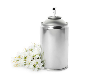 空气清新剂和白色背景花卉图片