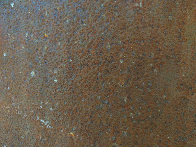 生锈表面的纹理旧铁皮图案的棕色背景带锈为设计师提供简约的背景