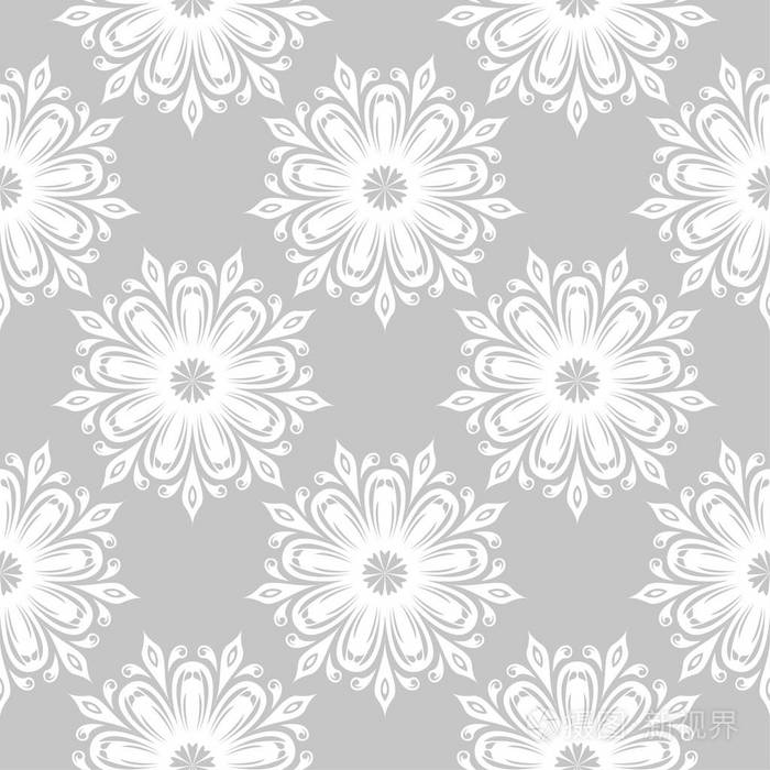 灰色背景上的白色花朵。 纺织品和壁纸的装饰性无缝图案