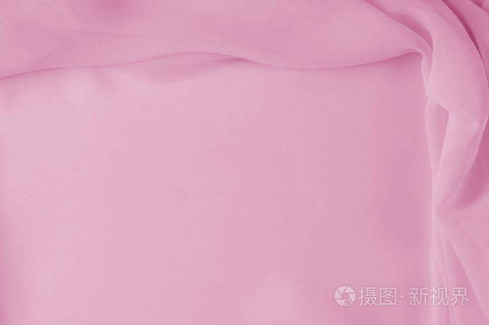 纹理背景图案. 丝绸织物淡粉色抽象褶皱