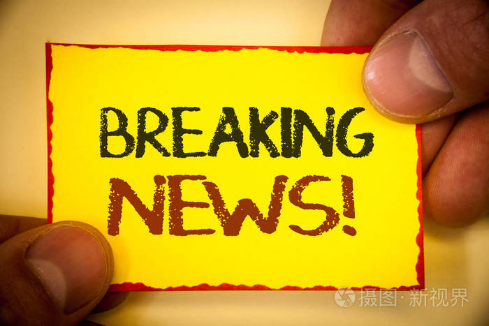 写纸条显示突发新闻动机电话.