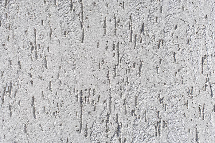 旧石膏白色墙壁的艺术质感. 白色混凝土纹理背景设计.