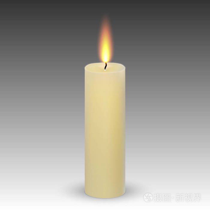 在白色背景上分离出真实的石蜡燃烧蜡烛