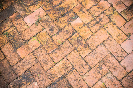 街道地面透视图上彩色图案铺装板的纹理. 水泥砖广场. 混凝土瓦板石.