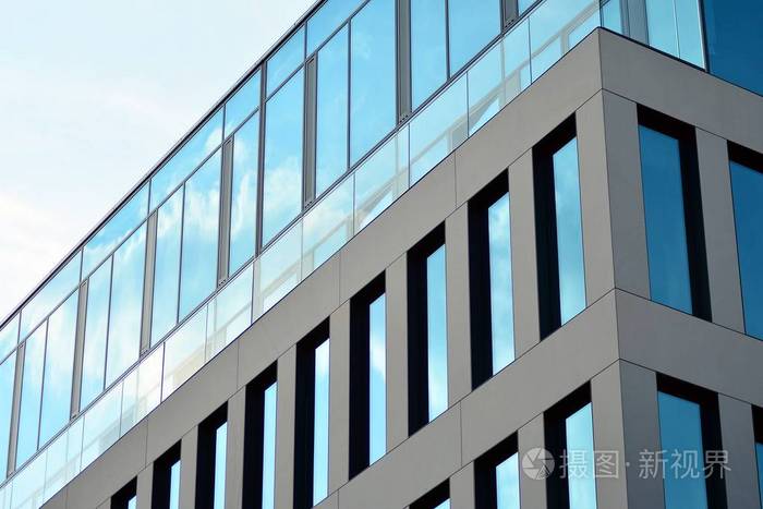 当代建筑墙的抽象碎片由玻璃和混凝土制成现代办公楼玻璃幕墙