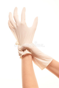 女医生的手戴着白色消毒外科手套