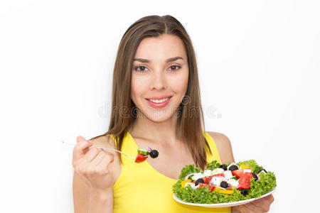 女性食用健康食品，希腊色拉