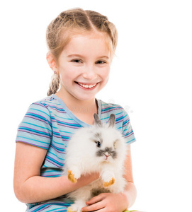 穷小孩带着兔子的小女孩照片