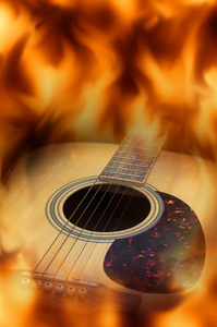 带有火焰屏幕的声学吉他。