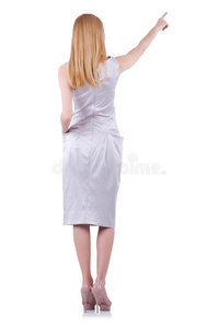 美丽的金发女郎穿着优雅的连衣裙，隔离在白色上