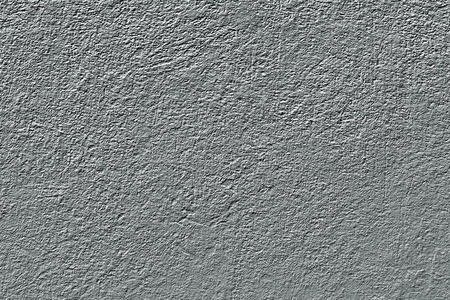 环绕素水泥灰泥墙面背景照片