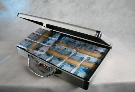 一个装满钱的手提箱照片