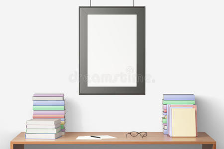 空白的画框挂在木桌上，上面有书，模拟你