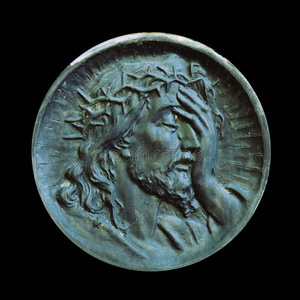 耶稣基督的苦难脸上画耶稣基督荆棘冠冕的脸(雕像)耶稣基督的脸轮廓