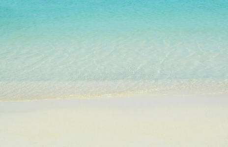海滩和沙子和蓝色的海水背景