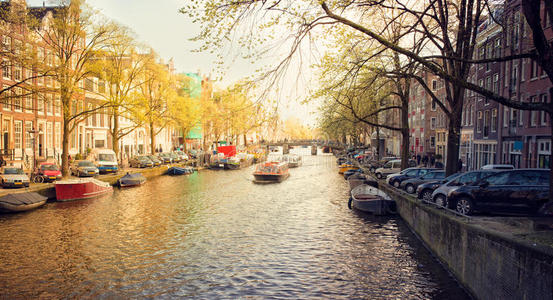 城市景观 傍晚 建筑学 运河 自行车 建筑 照亮 黄昏 阿姆斯特丹