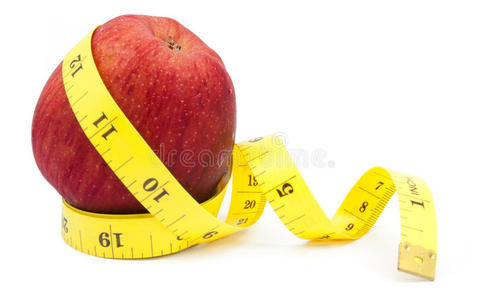 新鲜苹果与测量带隔离