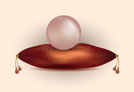红色缎子枕头上的一颗大的天然粉红色珍珠，上面有金色的流苏