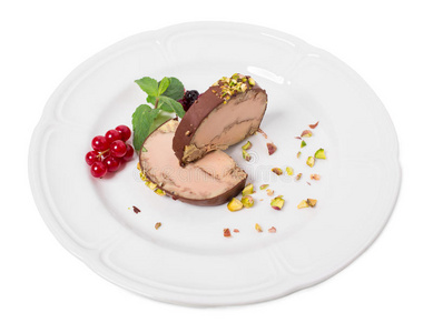 鹅痛风美味的鹅肝覆盖着黑巧克力.照片