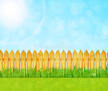 花园背景,绿草和木栅栏照片