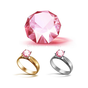 金色和银色订婚戒指与粉红色闪亮的透明钻石