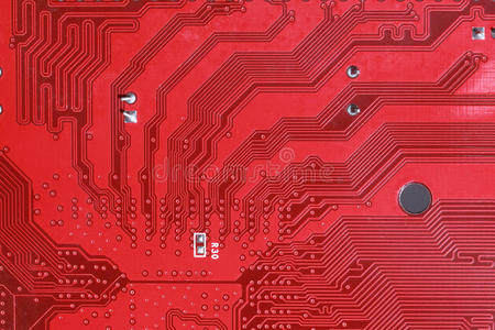 电子电路红板背景的特写照片