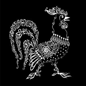 黑白公鸡,有花纹和漩涡. 中国日历上2017年新年的象征.照片