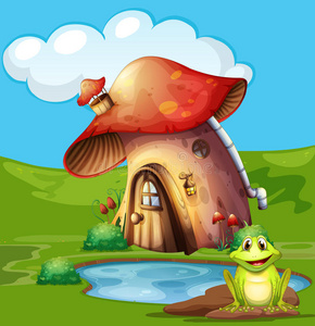 坐在池塘边的房子绿色的青蛙坐在池塘边照片