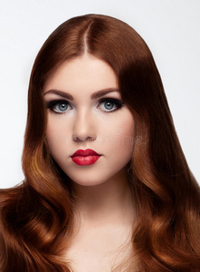 of woman with long curly beautiful ginger hair