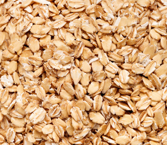 金色燕麦金色燕麦片的背景.照片