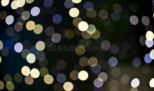 圣诞节日抽象假日背景与波克离焦的灯光和星星