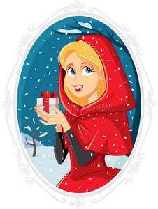 圣诞公主在冬天外面带着礼品盒照片