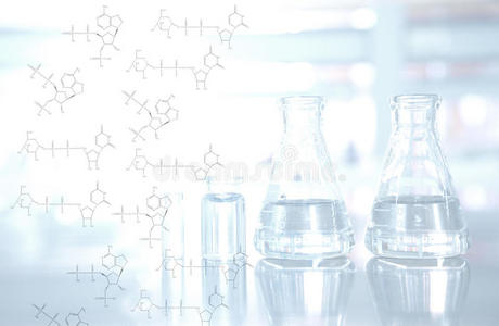 化学结构与瓶和瓶背景在科学实验室照片