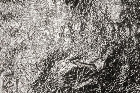 皱巴巴的银箔纹理照片