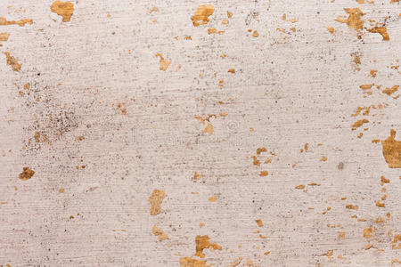 旧墙壁背景上的碎漆照片