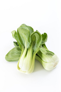 一堆新鲜的绿色婴儿bokchoy,白色的照片