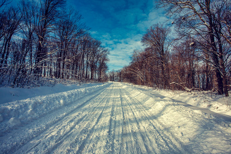 Empty snow covered road