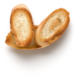 Toasted baguette slices isolated on white background close up.  