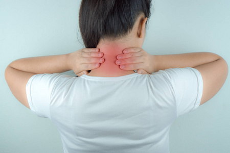 Closeup woman neck and shoulder feeling exhausted and suffering 