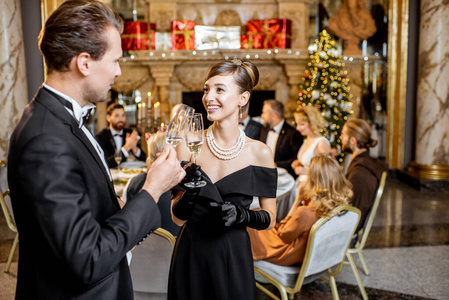 Elegant couple celebrating New Year holiday